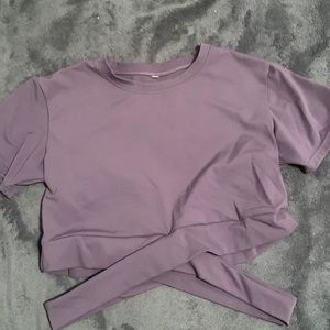 Purple athletic short sleeve with criss cross